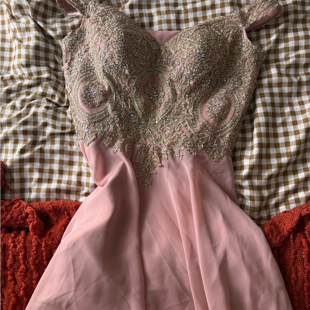 Elegant Pink Dress with Gold Embellishments